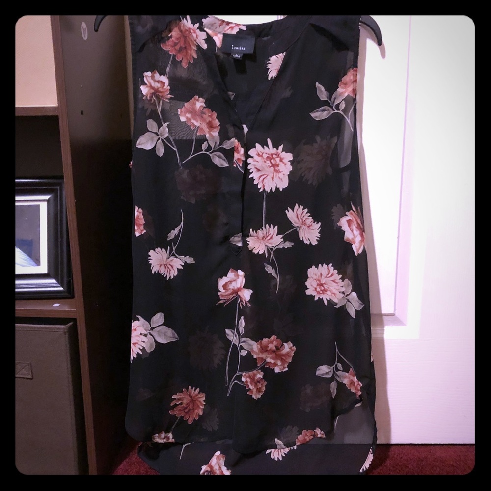 Beautiful see thru black top with flowers.